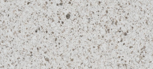 A sleek quartz countertop named Peppercorn White, offered in Bangalore, featuring a soft white base with subtle pepper-like speckles for an elegant touch.